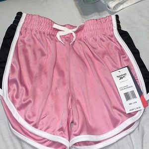 pink and black Reebok kids shorts